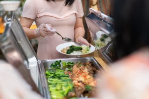 scooping the food, catering, dinner time